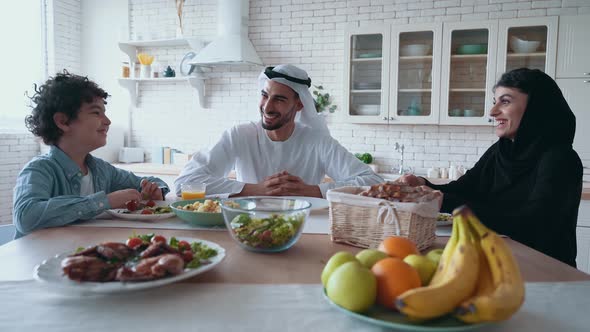 arabian family spending time together at home
