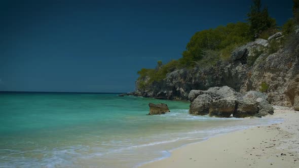 Playa Lagun Beach Cliff Curacao Beautiful Tropical Bay with White Sand and Blue Ocean Curacao