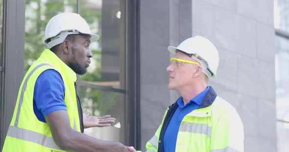 Two diversity senior industry engineer successful shake hands