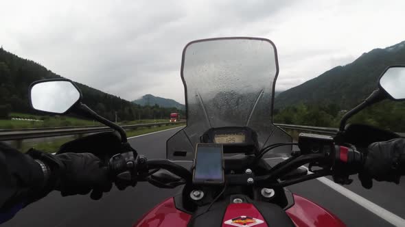 POV Biker Ride Motorcycle on Highway in Heavy Rain with Fog By Austria Mountains