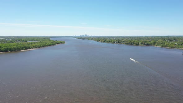 Aerial of Boat Heading Towards City