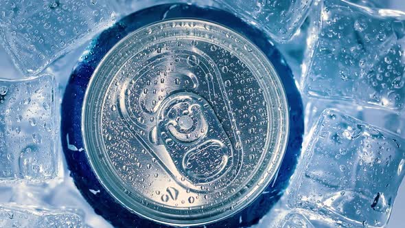 Aluminum Soda Tin Can Lid Cover of Soft Drink on Ice Goes Around the Circle