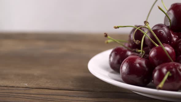 Berries the Cherries in a White Plate