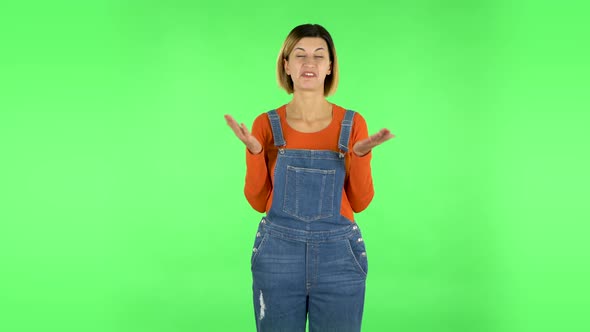 Girl Says Wow, Waves His Head Approvingly and Shows Thumb Like Sign. Green Screen