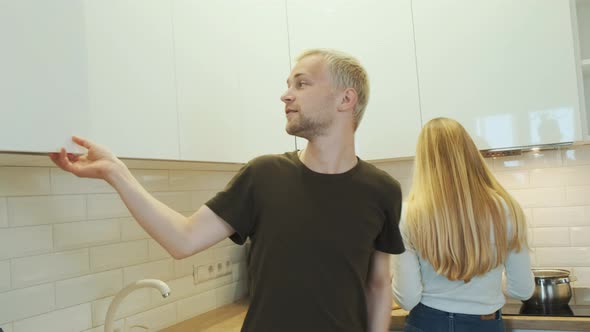 Young Happy Blonde European Couple of Friends Having a Conversation