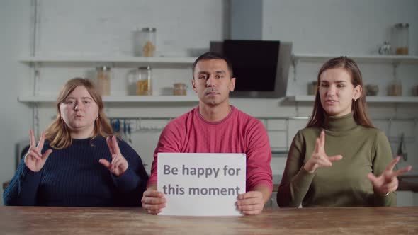 Deaf People Showing Words on Sign Language Indoors