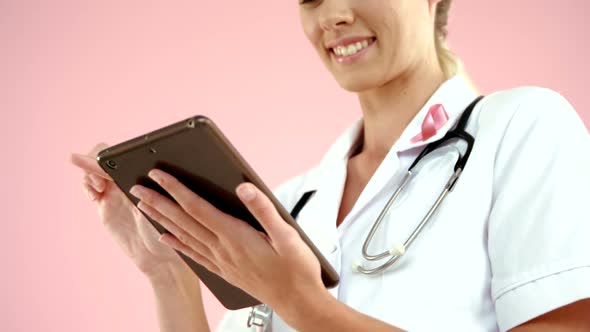 Doctor using digital tablet