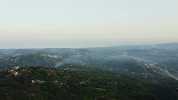 Nature in Calabria and smoke coming out chimney