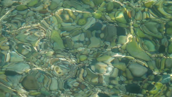 Ripples on Surfview of the Sea Bottom Through a Slight Excitement. Slow Motion . Close Up