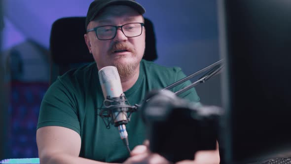 Adult Man In Glasses With Borodai Leads A Live Stream