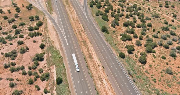 Horizontal Panorama Trucks Stop on Rest Area Near Interstate Highway in Desert Arizona