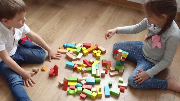 Two Happy Preschool Siblings Children Boy Girl In Playing Room