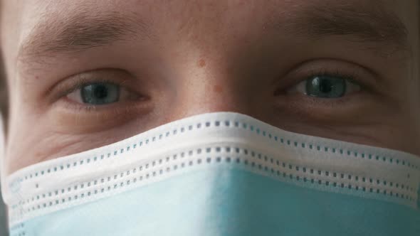 Close up head portrait young serious cautious man employee.