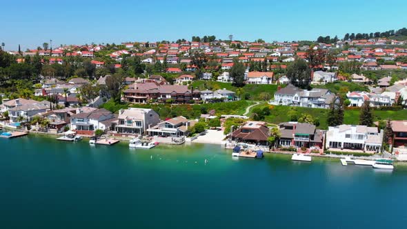 Aerial fly by of luxury house on community Lake Mission Viejo