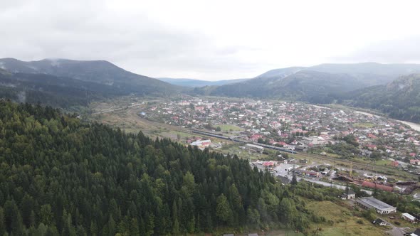 Village in the Carpathian Mountains in Autumn. Slow Motion, Aerial View