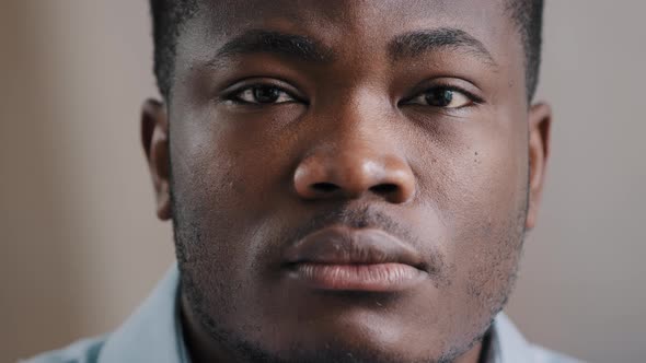 Portrait of Serious Handsome African American Young Man Guy Student Freelancer Stand Posing Indoors