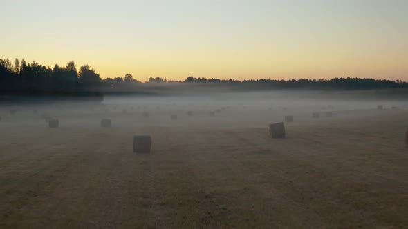 Flight Above Hay Roll Field