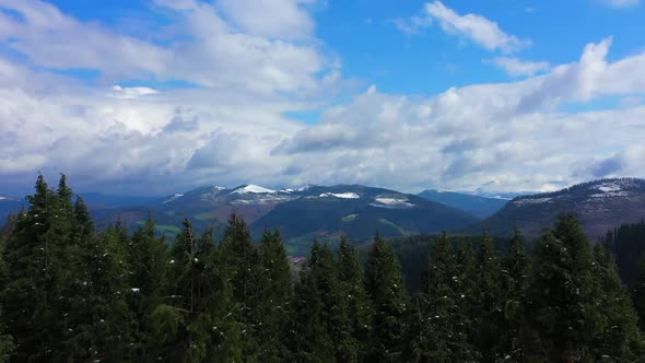 Flyover Forest tree tops revealing majestic mountainous Scenery, Kolizta Mount, Bizkaia. Spain