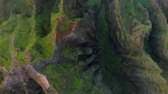 Coastal Terrain of Hawaii. Topdown Aerial Footage. Rocky Ridges and Deep Gorges