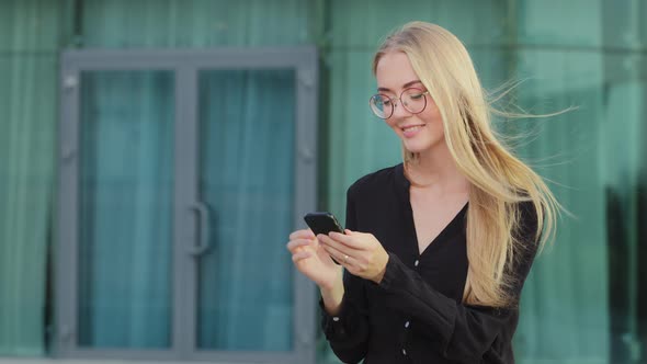 Cheerful Caucasian Female Student Sitting Outdoor Blonde Young Woman Using Telephone Take Break