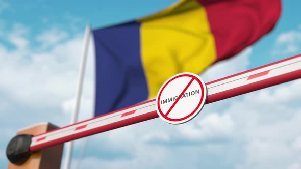 Open Boom Gate with No Immigration Sign at Romanian Flag alt