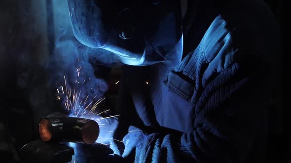 Metal welding. Semi-automatic welding. Welder. Car tuning. Car repair