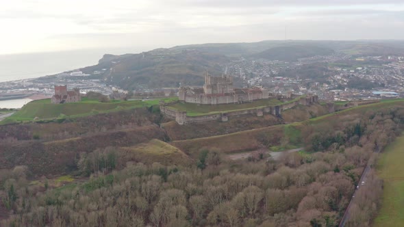 Aerial shot of dover castle with harbour and town in background UK