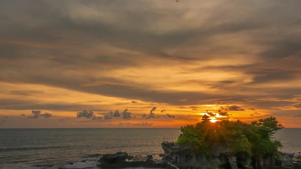 Sunset Over the Ocean and Temple on the Island