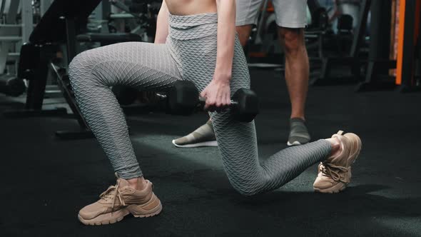 Closeup Shot Showing Legs of Two People at the Gym