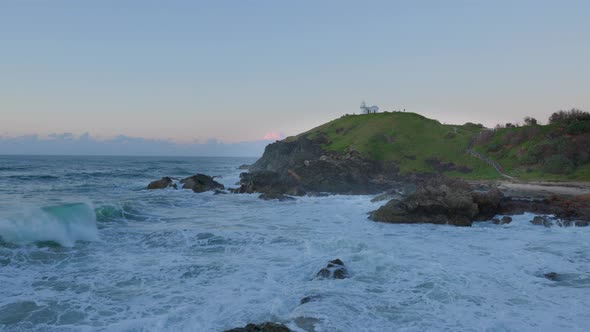 Dawn View of Waves Breaking at Tacking Point Lighthouse