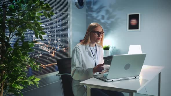 Psychologist Therapy Session Online Woman in Lab Coat Making Video Call with Patient on Computer