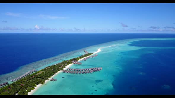 Aerial drone tourism of perfect lagoon beach lifestyle by blue sea and white sandy background of a p