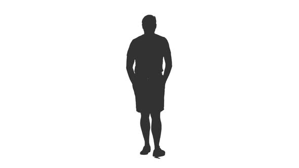 Silhouette of Man in Shorts Walking with Hands in Pockets alt