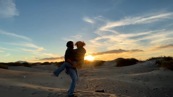 Relationship people man and woman hugging in love. Happy romantic adult couple in love enjoy sunset