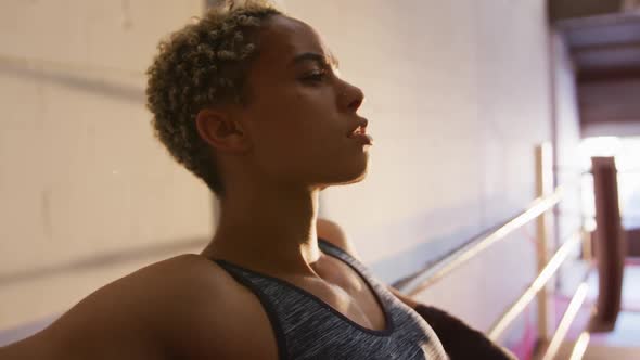 Close up view of fit woman in boxing gym