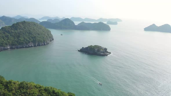 Aerial: unique flying over Ha Long Bay and Cat Ba island, famous tourism destination in Vietnam