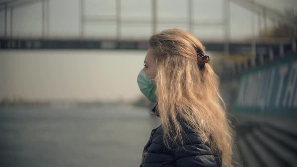 Girl Walking In Protective Mask COVID19 Virus. Health And Safety Concept. Pandemic Coronavirus.