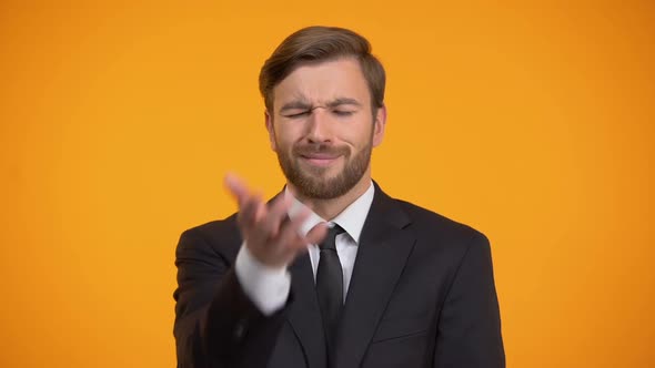 Disappointed Office Worker Doing Face Palm Gesture, Orange Background, Problem