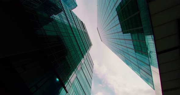 Time Lapse Low Viewing Angle on the Facade of a Skyscraper