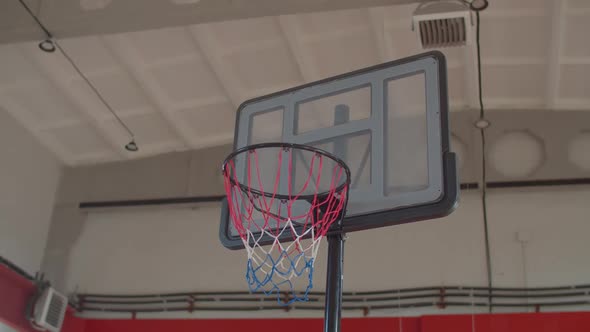 Black Basketball Players Driving To Hoop To Dunk