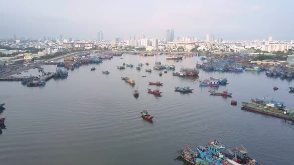 Flying Cam Zooms Out Fishing Boats Drifting at Moorage