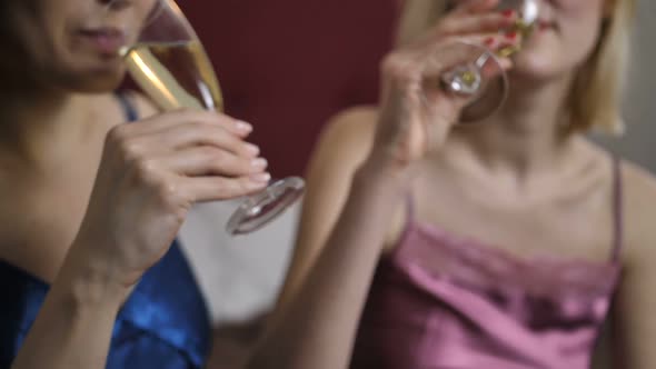  Friends Toasting Champagne at Home