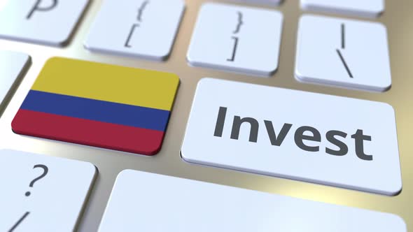 INVEST Text and Flag of Colombia on the Computer Keyboard