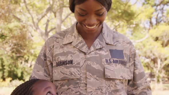 Happy female military US AIR FORCE with her two children