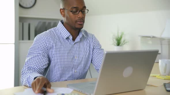 Businessman working on computer in office