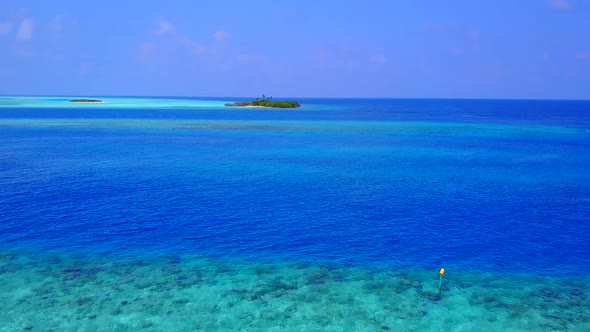 Summer landscape of lagoon beach by blue sea with sand background before sunset