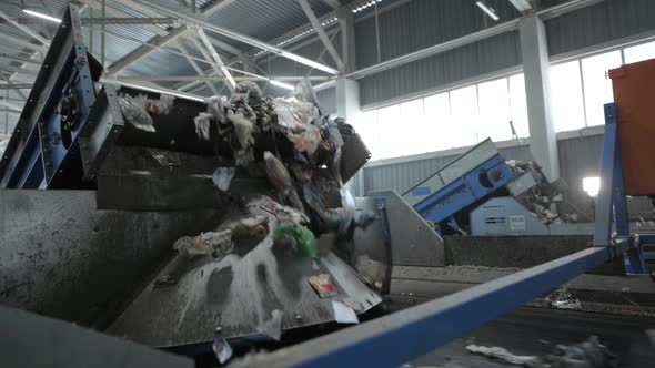 The Waste Stream Is Reloaded From One Conveyor To Another