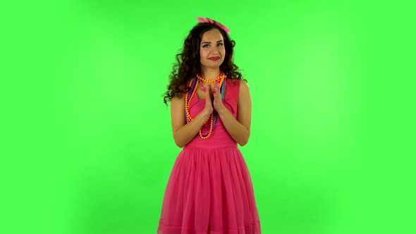 Girl Says Wow with Smile on Green Screen at Studio