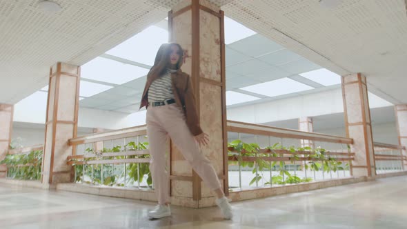 Young Woman Is Dancing In Beautiful Hall