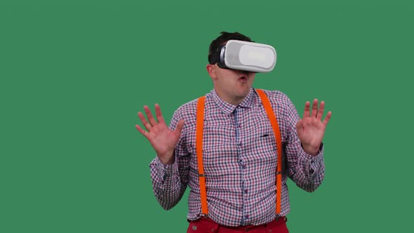 Portrait of a Man with a Virtual Reality Headset or 3d Glasses on His Head